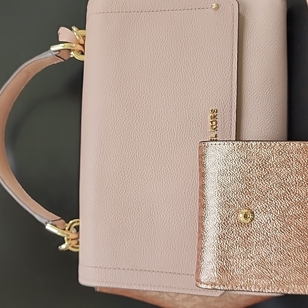 Light pinkish Michael Kors purse and wallet